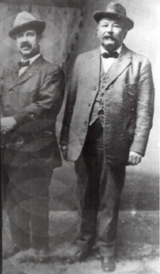 Figure 2: Frederick Engelhardt (left) with Benjamin Austin, Peerless' master music maker. This photo is from Austin's album under which was written by Mrs. Austin, "Ben and the big noise." 