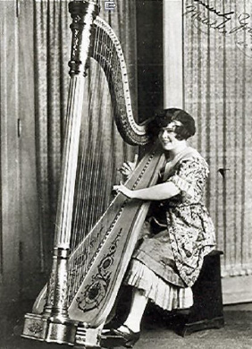 Matilda Jackson playing her Style GG Wurlitzer harp