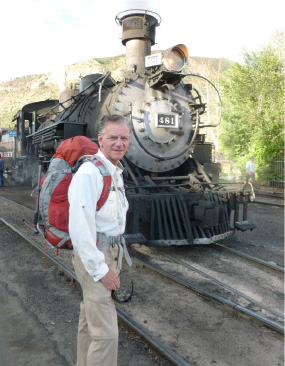 Rick C. with the steam locomotive at the station ready for the ride.